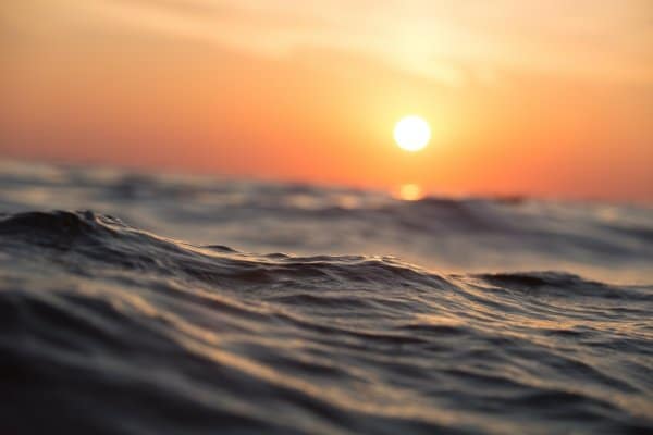 Sunset over ocean waves off the Oregon coast